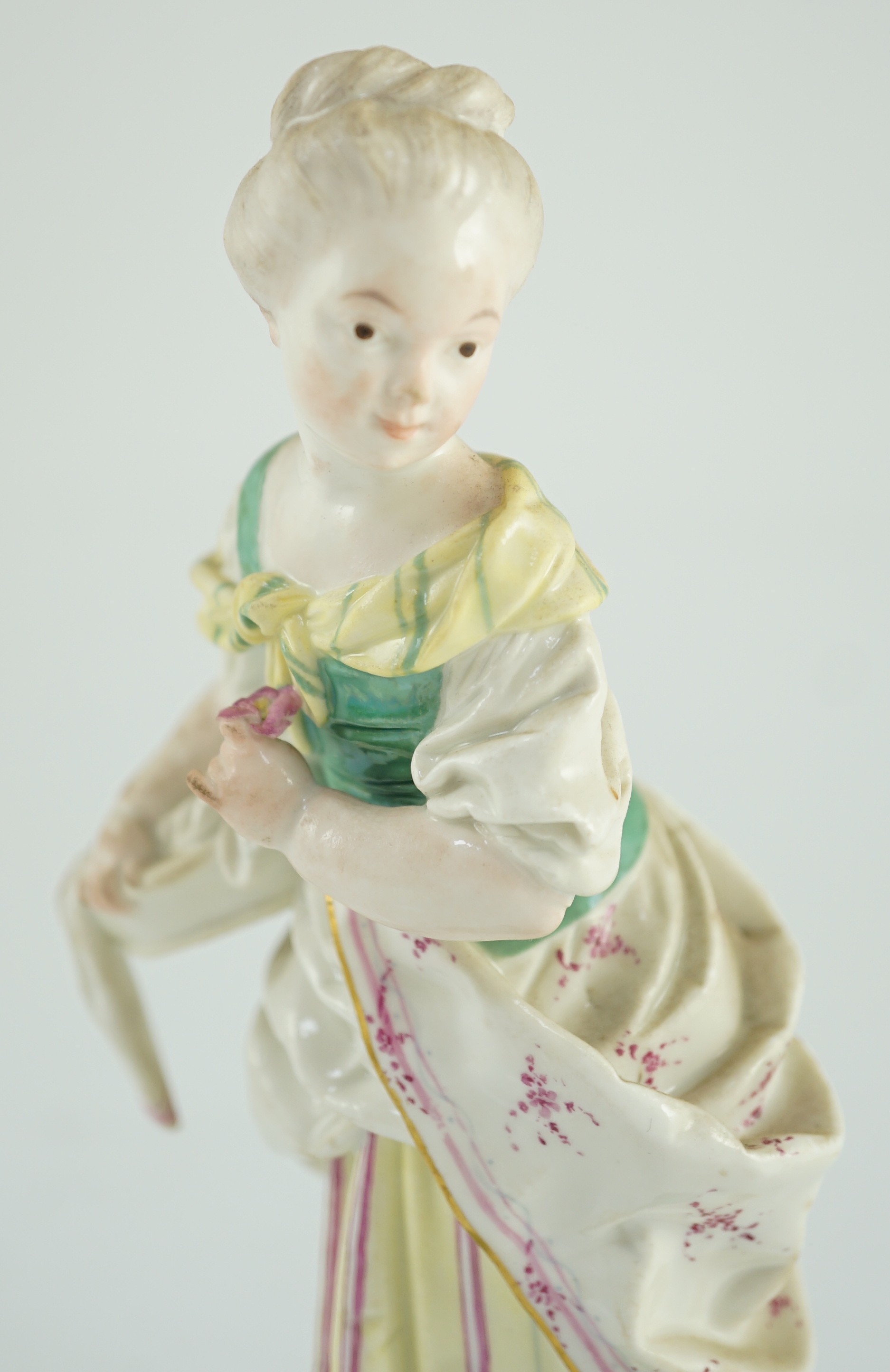 A Höchst figure of a flower posy girl, c.1770-1775, modelled by J.P. Melchior, 18cm high, Provenance - purchased from Winifred Williams, Eastbourne/London before 1970.